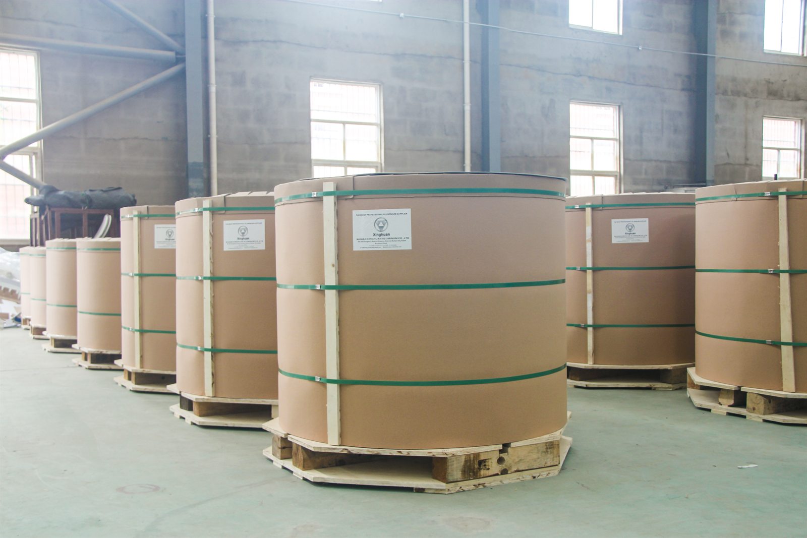 Packaged coils of precision-slit aluminium strip